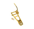 Gold metal tremolo tailpiece with tension bar and four screws for attachment
