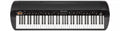 Black and white keyboard synthesizer with multiple knobs and buttons and a small central display screen.