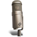 Beige studio microphone with mesh grille and United logo on the body, mounted on a pivoting arm.