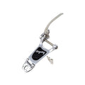 Polished silver metal vibrato tailpiece with black Bigsby logo and four screws on white background.