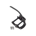 Black metal vibrato tailpiece with lever and four screws on a white background.
