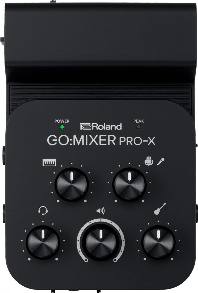 Top view of a black Roland GO:MIXER PRO-X audio mixer with five control knobs and indicator lights.