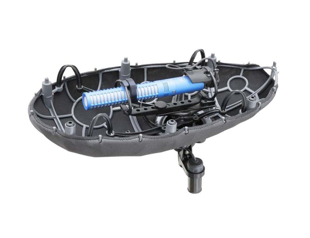 Blue microphone mounted in a black shock mount with oval frame and mounting clamp attached underneath.