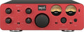 Front view of a red and black SPL Phonitor xe headphone amplifier with various dials, switches, two VU meters, and headphone outputs.