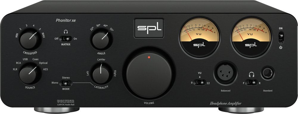 Black SPL Phonitor xe headphone amplifier with multiple knobs, switches, VU meters, and headphone output connectors.
