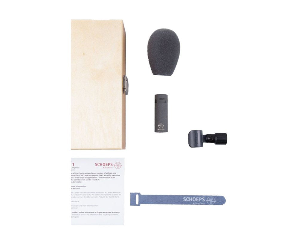 Microphone capsule set with foam windscreen, clip, velcro strap, wooden box, and instruction leaflet.