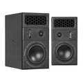 Pair of black PMC 6 studio monitor speakers with hexagonal grill and woofer visible on front.