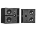 Two black studio monitor speakers stacked and placed side by side with visible PMC logo and multiple drivers.