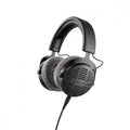 Black over-ear wired headphones with gray fabric ear pads and b eyerdynamic branding on the headband.