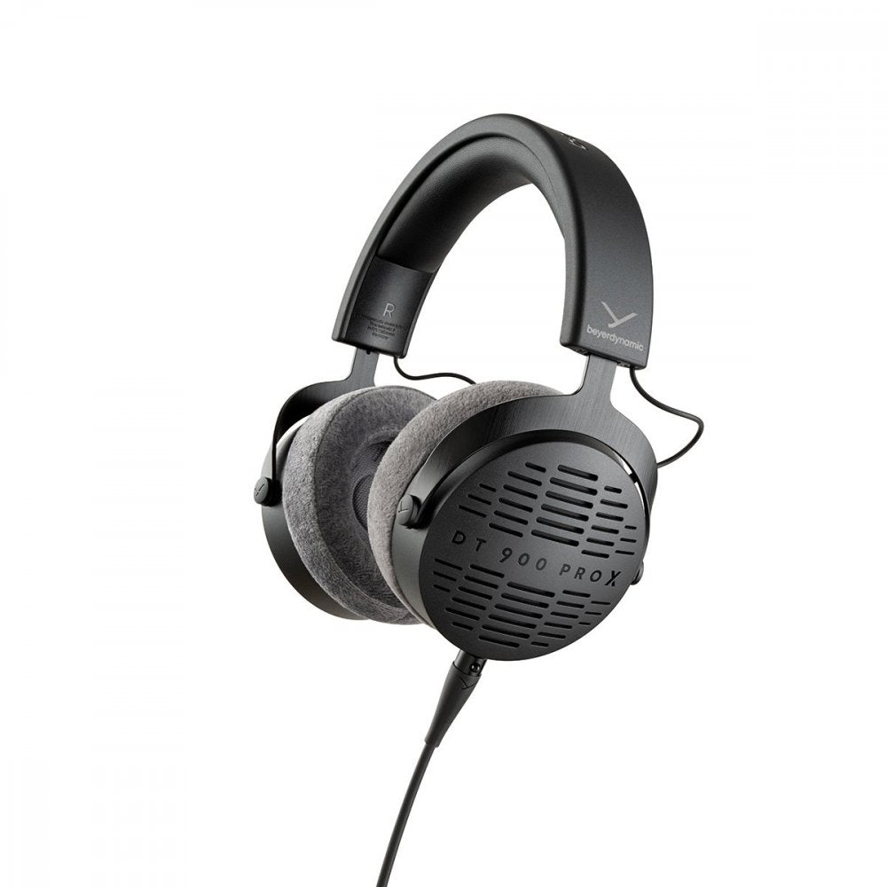 Black over-ear wired headphones with gray fabric ear pads and b eyerdynamic branding on the headband.
