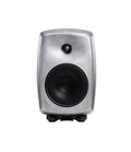 Front view of a silver-colored speaker with black speaker grilles and a small logo at the bottom