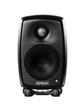 Black compact active speaker with two drivers and GENELEC logo on front.