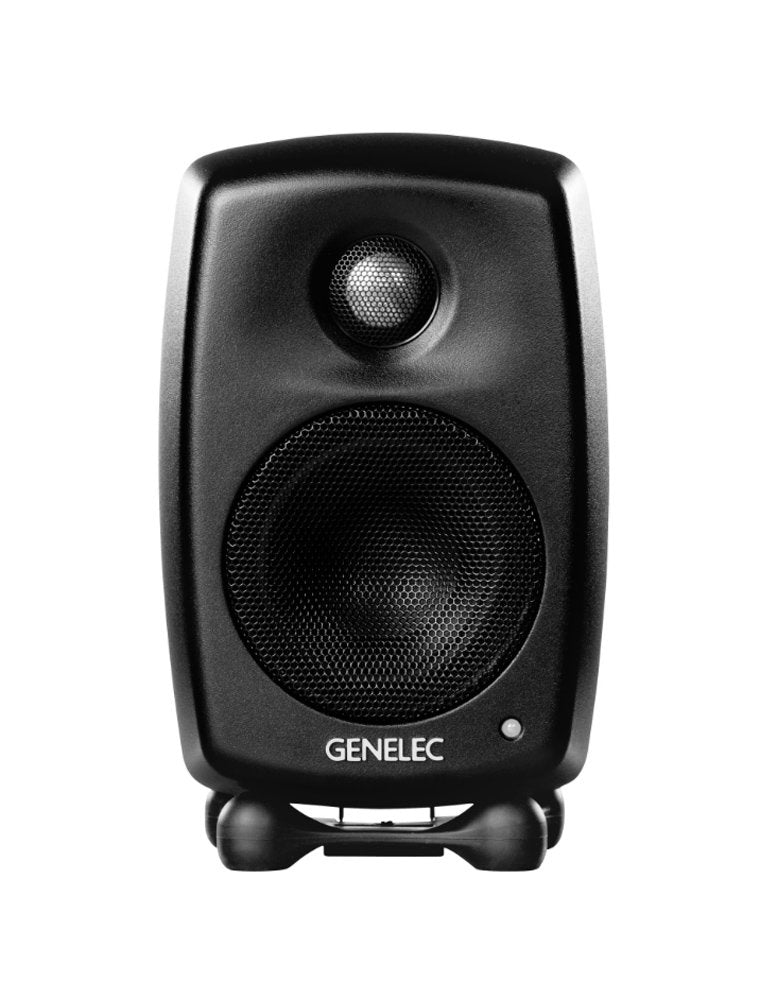 Black compact active speaker with two drivers and GENELEC logo on front.