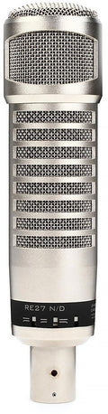 Silver studio microphone with a mesh grille and switches near the connector end.