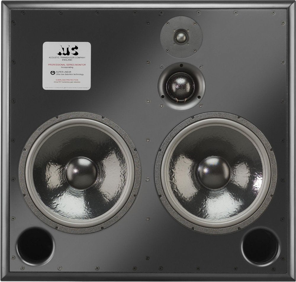 A large black rectangular ATC SCM300ASL Pro active studio monitor on a matching stand, with a soft dome tweeter and midrange dome above twin 15-inch bass drivers on the front baffle.