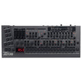 Black Roland JD-08 programmable synthesizer with buttons, sliders, knobs, and a small display screen.