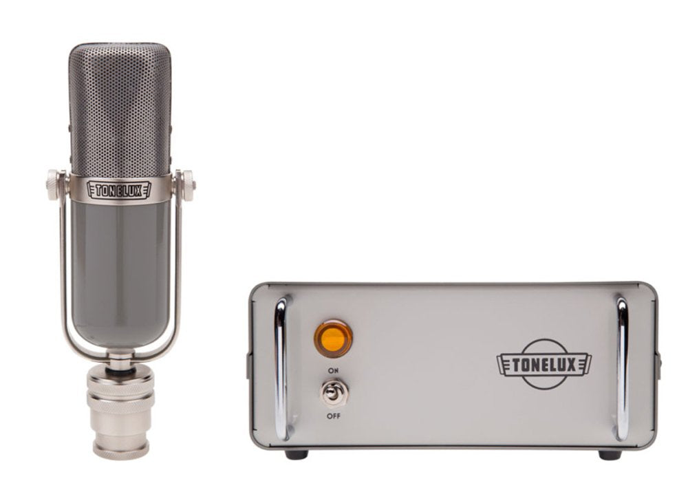 Silver microphone and a matching silver power supply unit with a toggle switch and an orange indicator light.