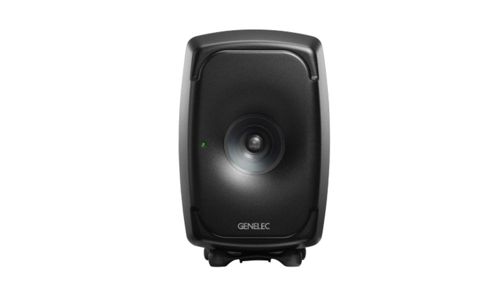 Black Genelec studio monitor speaker with visible driver and stand against a white background.