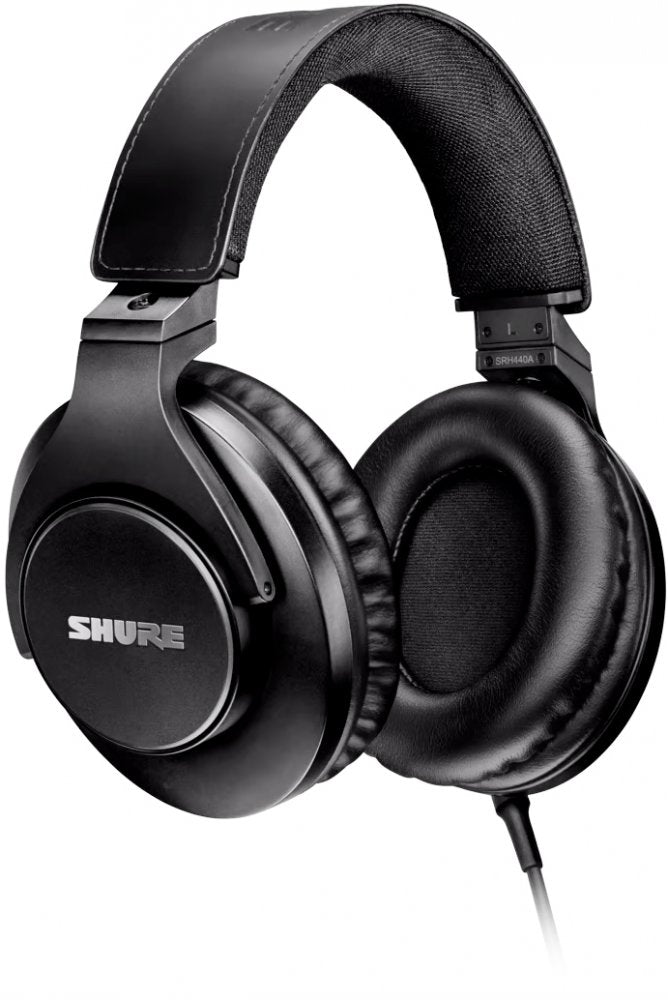 Black over-ear wired headphones with cushioned ear pads and fabric headband interior.