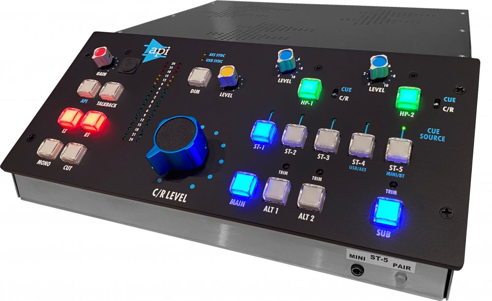 Audio control device with multiple knobs, illuminated buttons, and sync indicators on black metal faceplate.