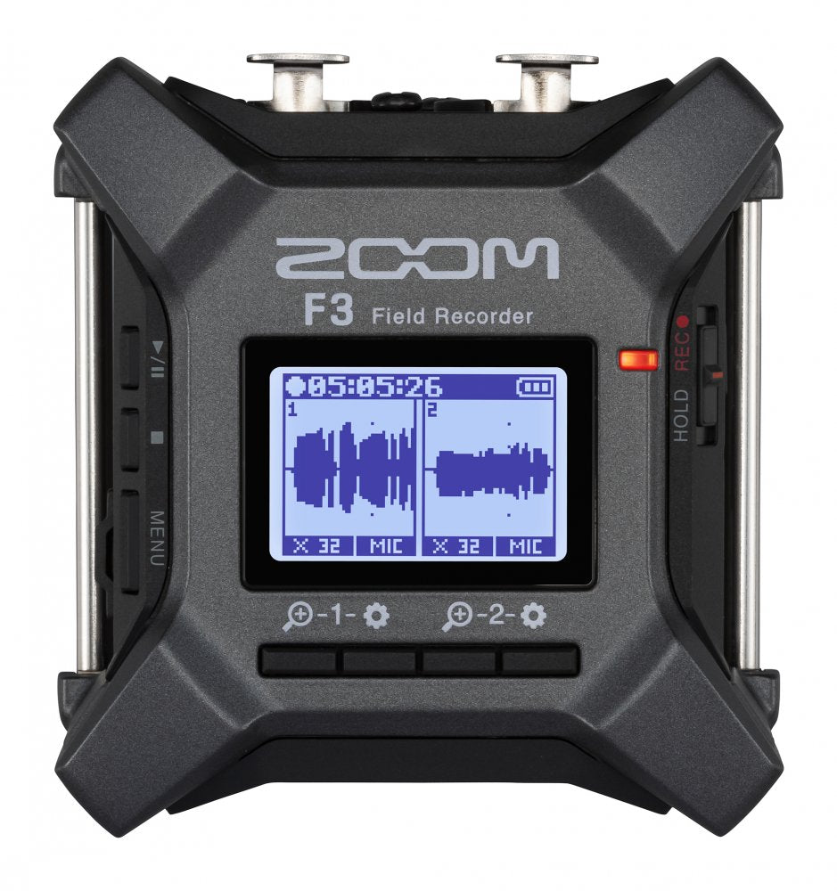 Black and gray Zoom F3 Field Recorder with display showing waveforms and control buttons visible.