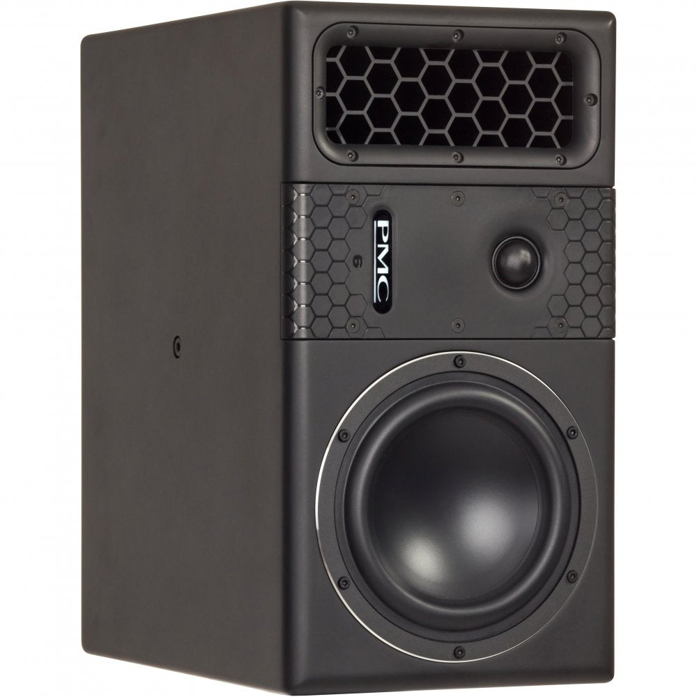 Black PMC studio monitor speaker with a large woofer, tweeter, and a hex design on the front panel.