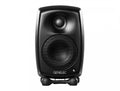Front view of a black GENELEC active studio monitor speaker with two speaker drivers and a small indicator light.