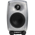 Front view of a silver raw metal active studio monitor speaker with black speaker grilles and isolating stand.