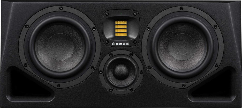 Front view of a black speaker with two large woofers, a small tweeter, and a yellow ribbon tweeter between them.