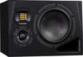 Black studio monitor speaker with three drivers and a front bass reflex port.