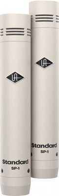 Two light gray microphones with black logos labeled Standard SP-1 shown side by side.