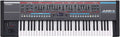 Black Roland JUNO-X programmable polyphonic synthesizer keyboard with various sliders, knobs, and buttons.
