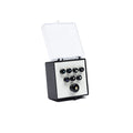 Black guitar bridge and end pins with pearl inlay displayed in a white holder inside a clear plastic box