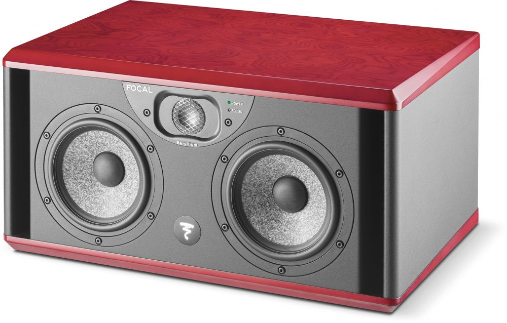 Black and red studio monitor speaker with dual woofers and a central tweeter with indicator lights.