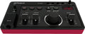 Black and red Roland E-4 voice tweaker synthesizer with knobs, sliders, buttons, jacks, and digital display