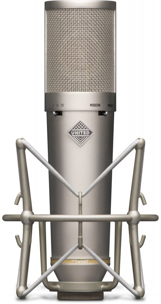Silver studio microphone with mesh grille and shock mount holder visible from front.