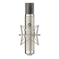 Silver condenser microphone mounted in a shock mount shown frontally with a visible XLR connector.