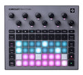 Top view of a Circuit Rhythm music production controller with knobs, buttons, and illuminated pads.