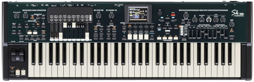 Black and white keyboard synthesizer with various knobs, sliders, buttons, wheels, and a screen in the center.