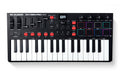 Black compact MIDI controller keyboard with white keys and various knobs, pads, sliders, and buttons.