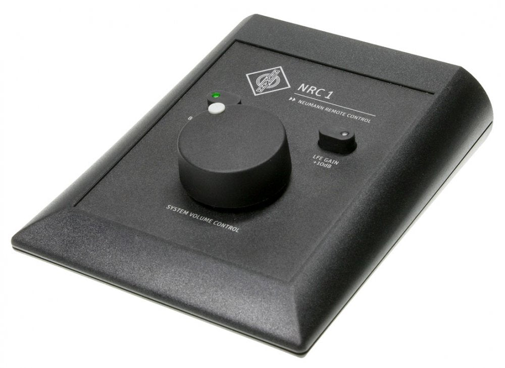 Black volume control device with a rotary knob, toggle switch, and green LED indicator on top surface.
