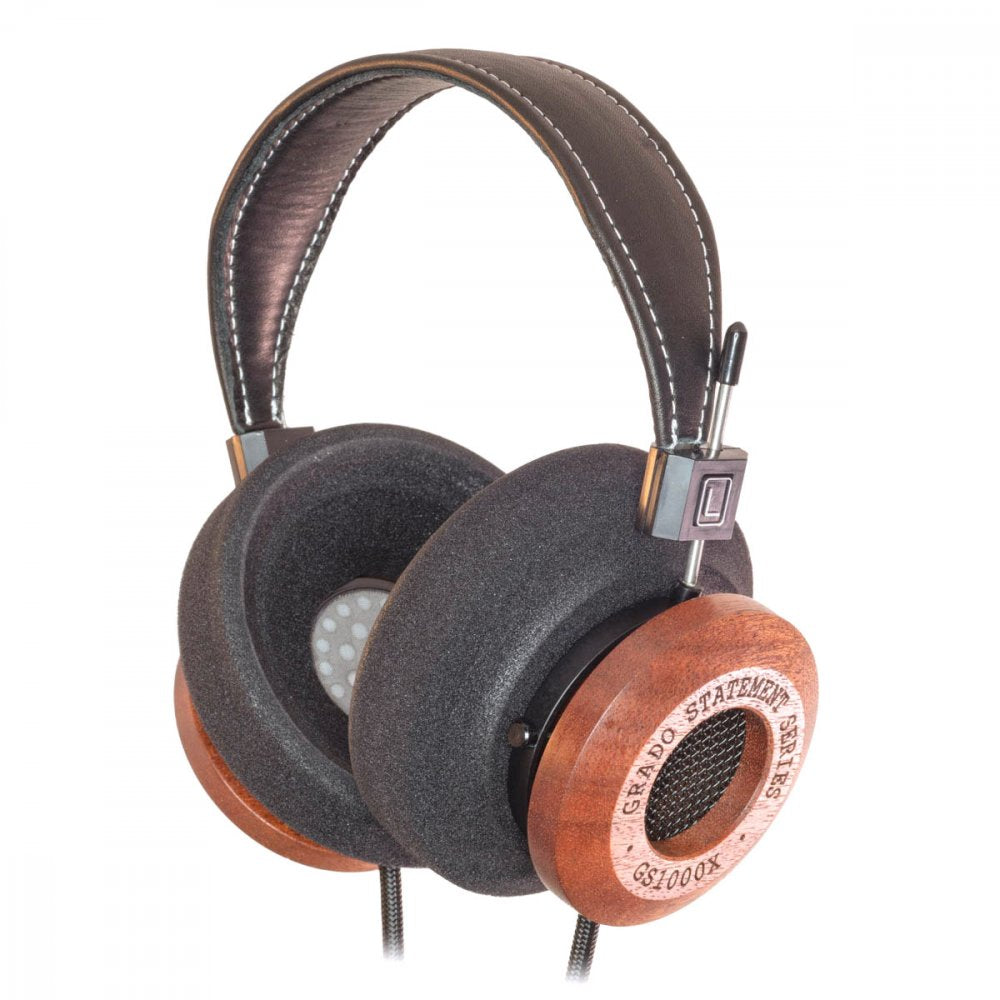 Over-ear headphones with black padded headband and foam ear pads, wooden outer ear cups with text, wired cable.