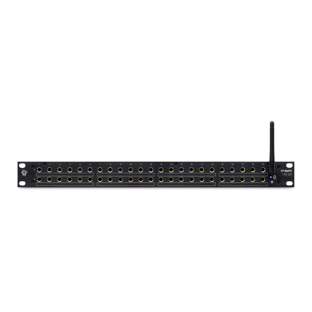 Black rackmount patchbay with four rows of 1/4 inch TRS jacks and a wireless antenna on the right side.