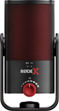 Front view of a black and red Rode microphone with a red rotary knob and USB port symbol.