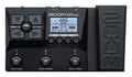 Black Zoom G2X Four multi-effects guitar pedal with display, knobs, buttons, and expression pedal.