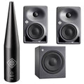 Two black studio monitors, one subwoofer, and one black device labeled NEUMANN MA1 P48 on a white background.