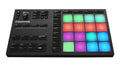 Black drum machine controller with multicolored backlit pads and various control buttons and a rotary knob.