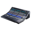 Black studio mixing console with multiple faders, knobs, buttons, and three colorful screens.