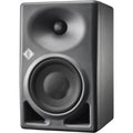 Black studio monitor speaker with grille and Neumann logo on front.