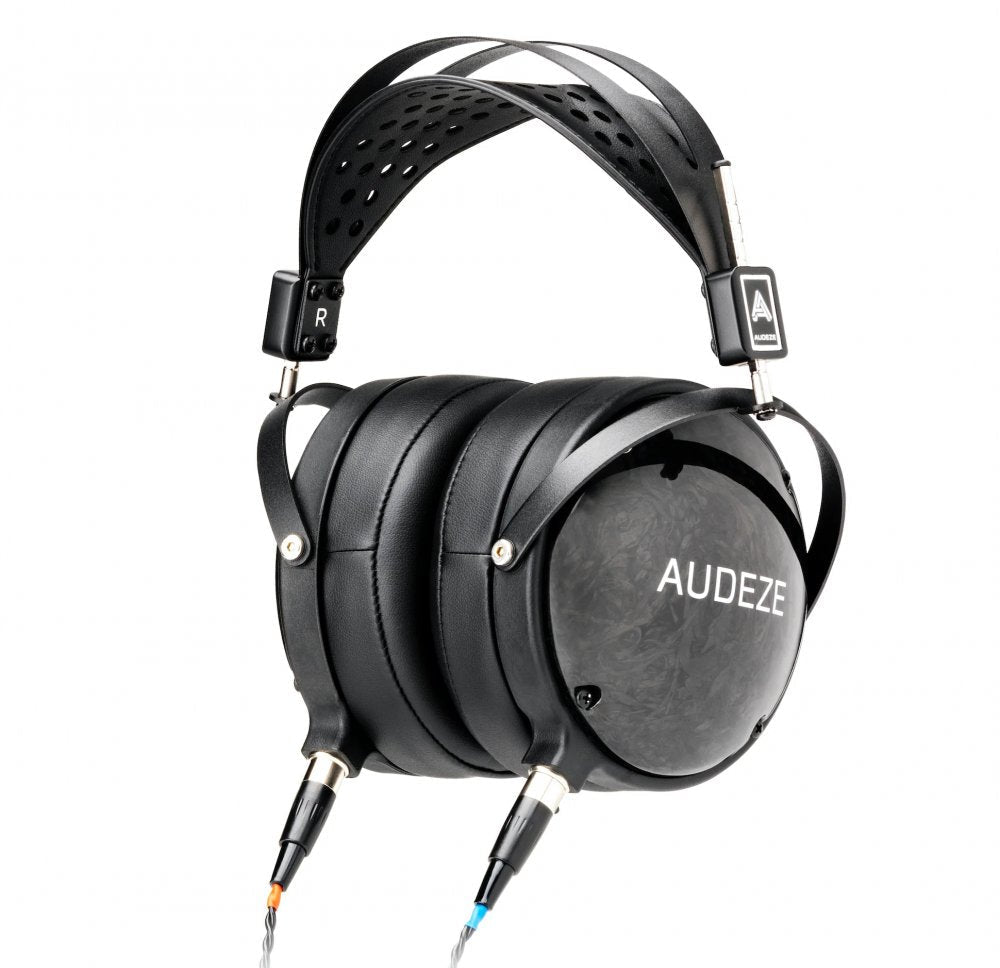 Black over-ear headphones with padded leather ear cups and headband, labeled AUDEZE, with two cables connected.